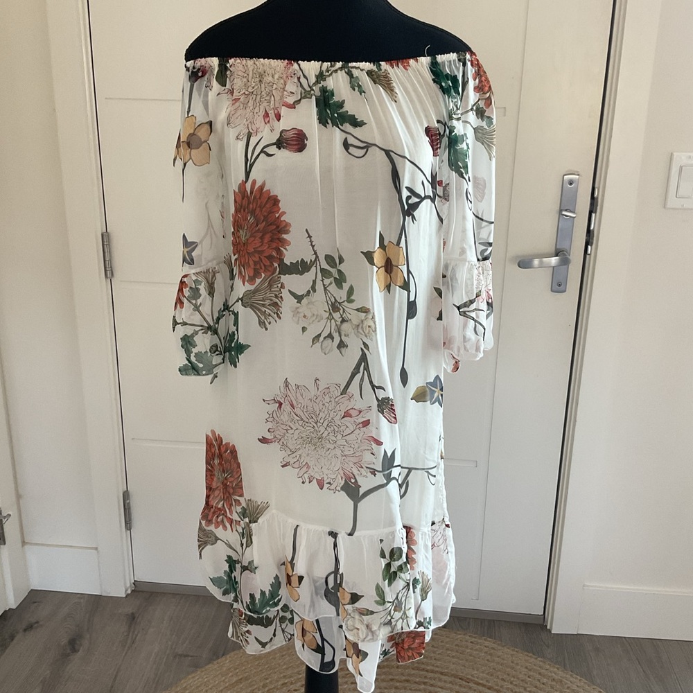 Silky  layered rounded neck floral light & Flowy  dress with flared Sleeves .